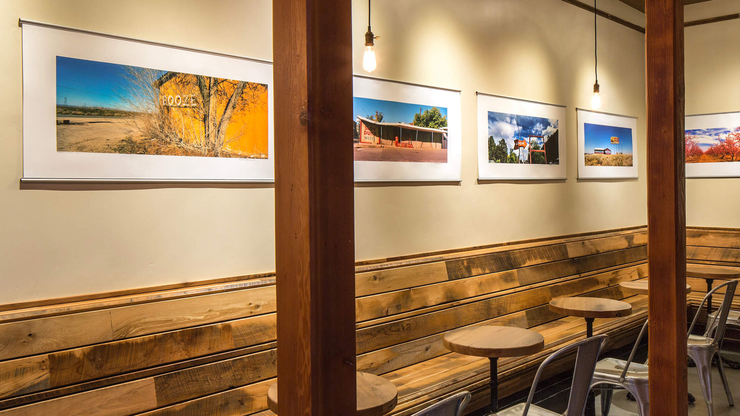 Photo exhibition installed in a cafe