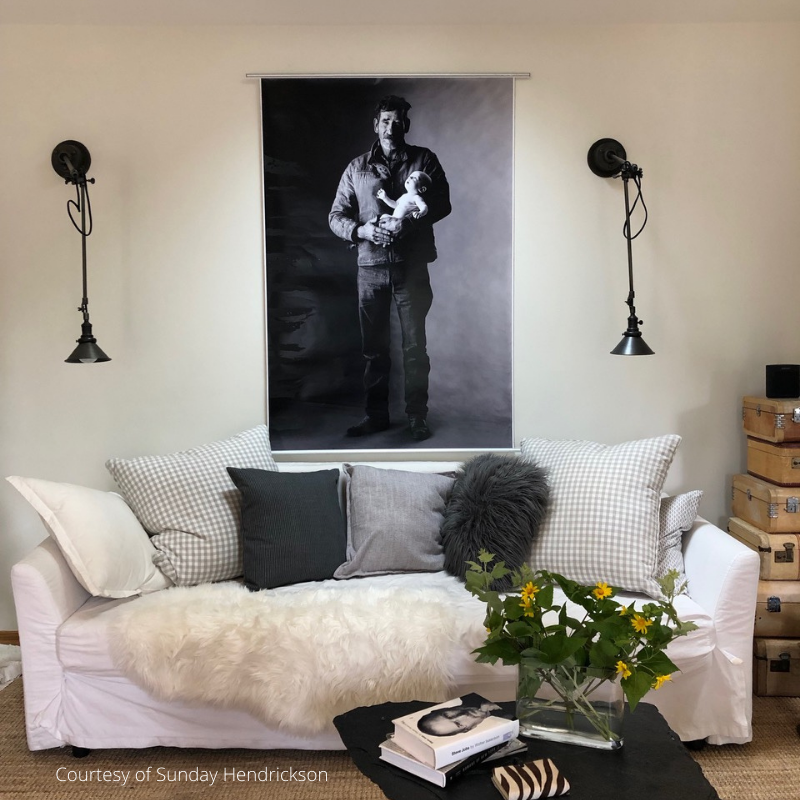 contemporary living room with poster on wall